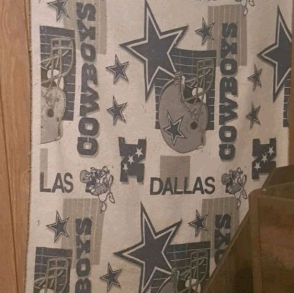 Dallas Cowboy blanket never used just been hanging